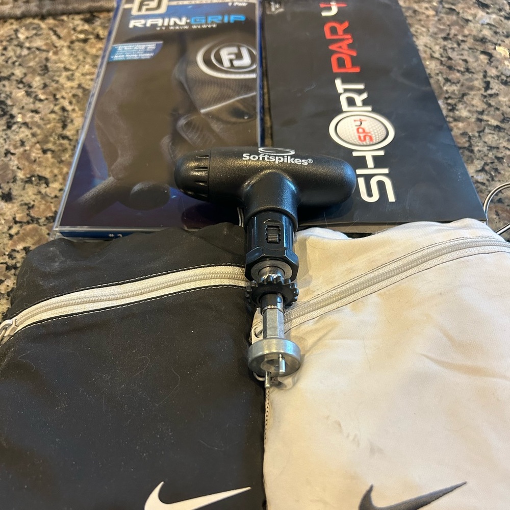 Nike dry fit sleeves, golf gloves, cleat changer